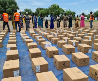 World Vision staff and volunteers on the line of duty in Mangala IDP camp, South Sudan, distributing the Vitameal.