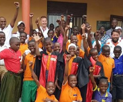 A group of children cheering