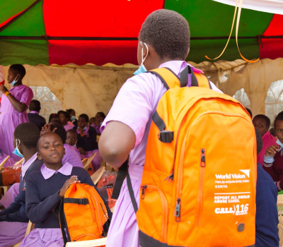 Staff engaging children in various activities in a fun day