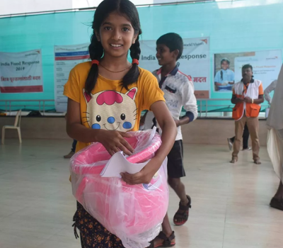 Girl holding a pink bucket