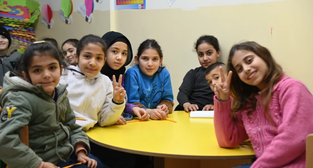 The Kids of Tripoli siting inside a classroom