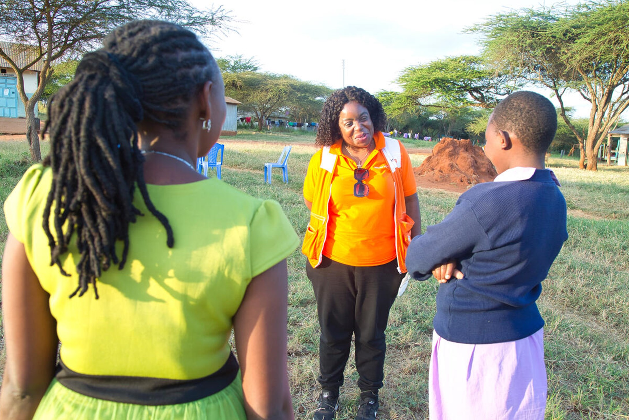 The National Director Lilian and the board members talking to Esther and the other girls