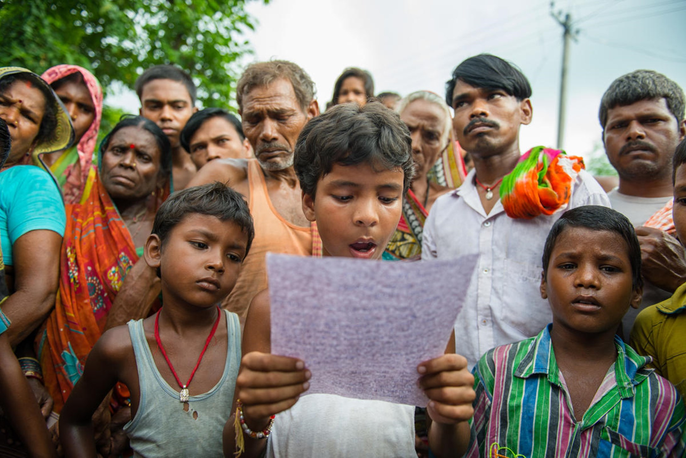 World Vision's sponsored child, Prince from India, reads aloud the letter he wrote to his sponsor