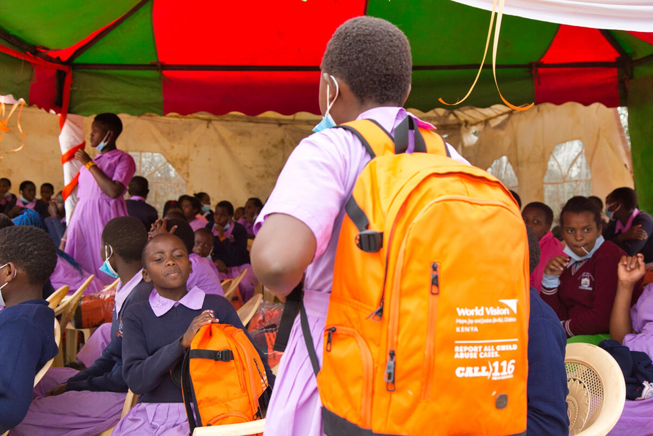 Staff engaging children in various activities in a fun day