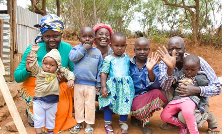 Veronica from Kenya and her husband Cosmas and the family at their home