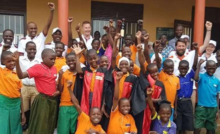 A group of children cheering