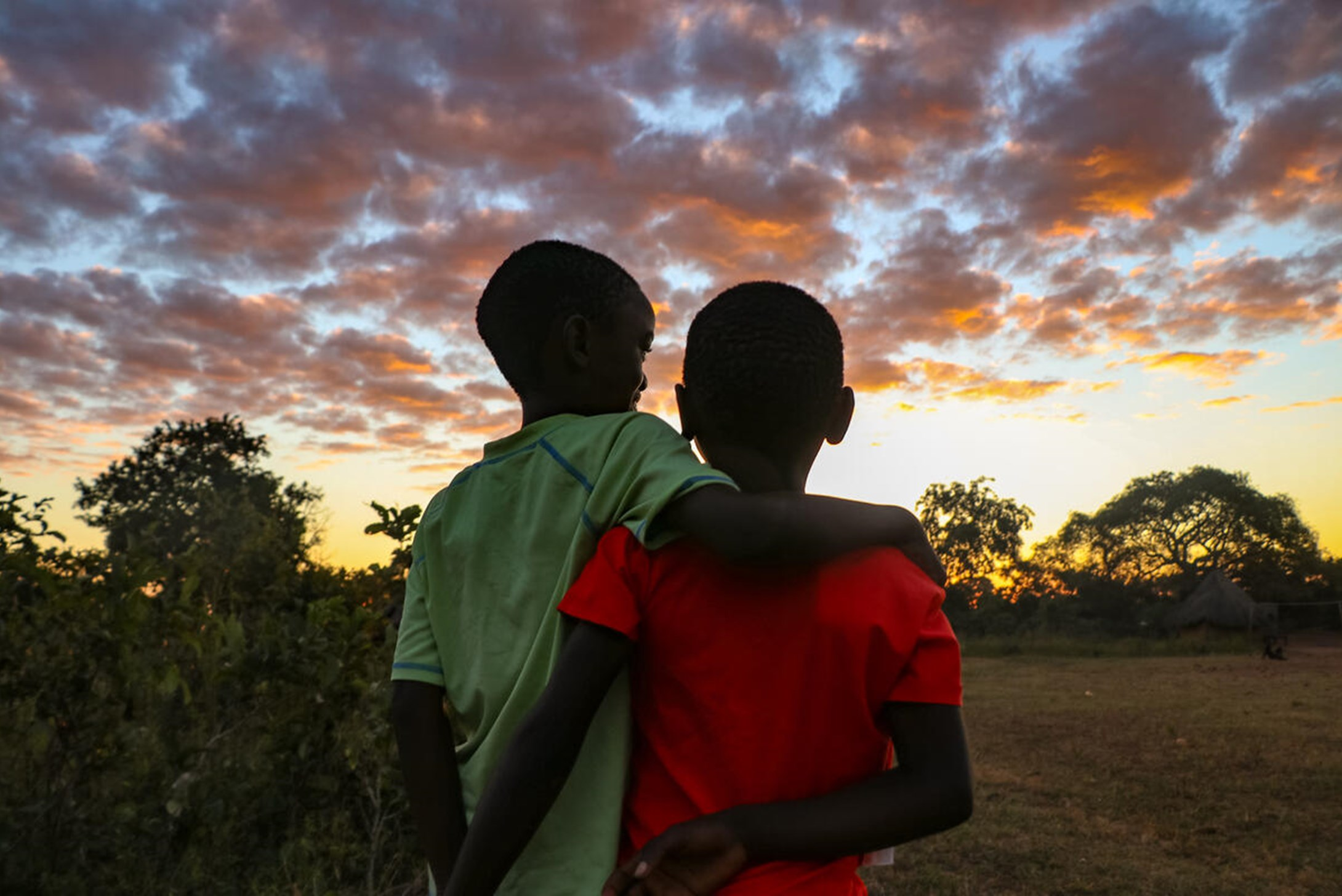 Brothers Billy (8) and Francis (12) from Zambia watching sunset.