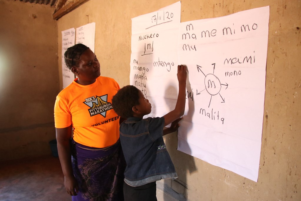 Rabson from Zambia learning in the reading camp. 