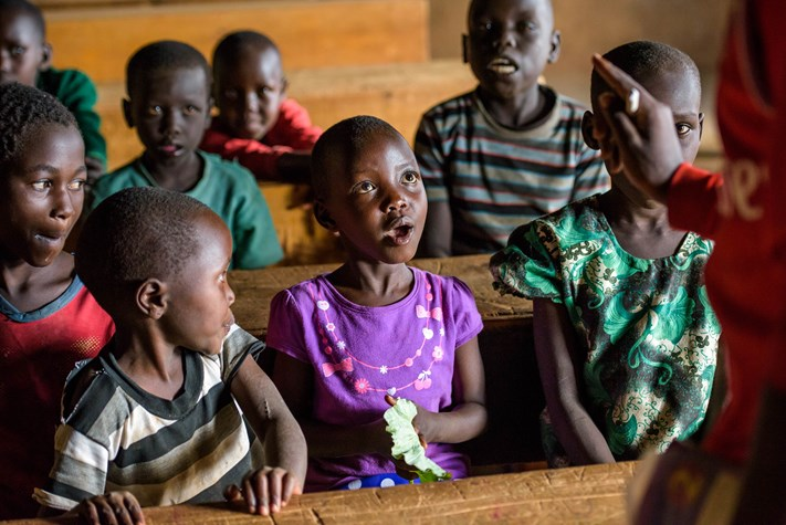 Children sitting in a classroom