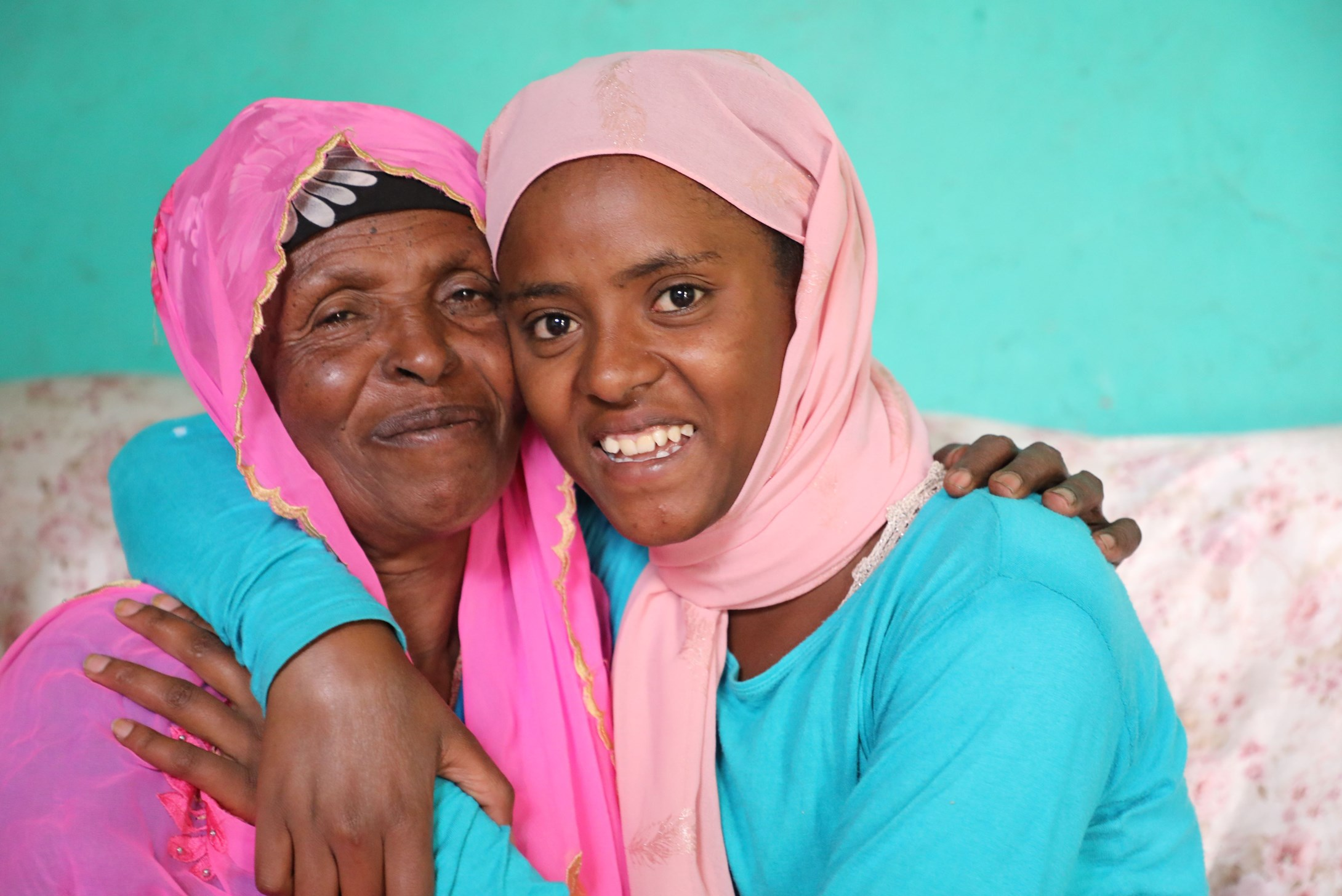 Girls from Ethiopia with her local district's Women, Children and Youth Affairs Office representative